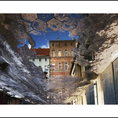 PHOTO A BACKYARD IN WROCŁAW – REFLECTION IN A PUDDLE FRAME 20 x 30 CM $ 500, MONICA GROBELNA